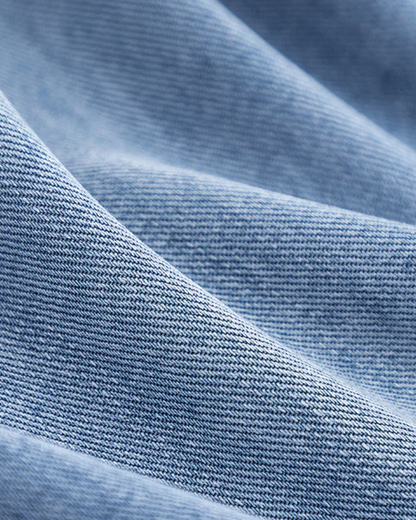 Sara - Denim en camelkleurige jas