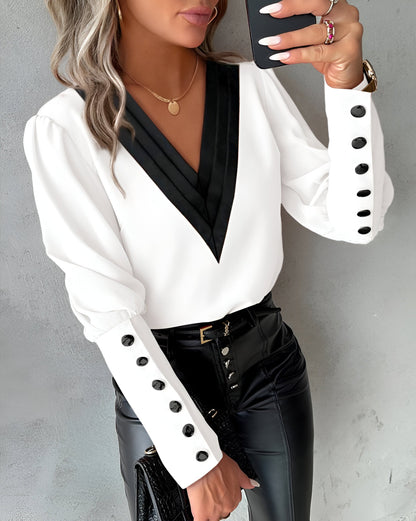 Caris - Blouse met V-hals en Colour Block